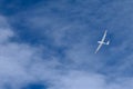 A glider flying across the blue sky Royalty Free Stock Photo