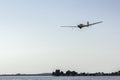 Glider flying upon the lake Royalty Free Stock Photo