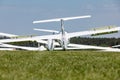 Glider on the grassy airfield. Royalty Free Stock Photo