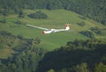 A glider Janus flying over Challes les eaux