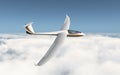 Glider over the clouds