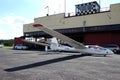 Glider plane standing on grass airport runway, at Pociunu airport, Lithuania Royalty Free Stock Photo