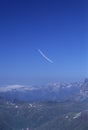 Glider plane turning over Pyrenees mountain