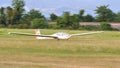 Glider ready to take off towing with a rope by a propeller airplane Royalty Free Stock Photo