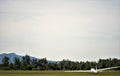 A glider or sailplane - aircraft landed on the ground. Royalty Free Stock Photo