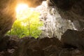 A glimmer of hope as rays of light stream into the cave from the