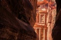 A glimp of the Treasury seen from the siq at Petra the ancient C Royalty Free Stock Photo