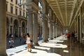 Glimpse of ancient downtown arcades in Rome street Turin Italy