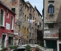 glimpse of the ancient houses of Venice with the names of the al