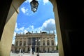 Glimpse of baroque historical Madama Palace through arcade in Castle Square