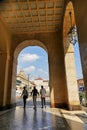 Glimpse of Castle square from historic iconic arcades at Rome street