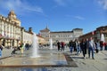 Glimpse of city downtown with crowd of tourists Turin Italy