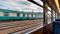 Express Train Ride View. Motion Blur Captures Speed and Journey Through Window on Tracks Royalty Free Stock Photo
