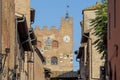 A glimpse of the historic center of Certaldo Alto, Florence, Italy, with the Palazzo Pretorio in the background Royalty Free Stock Photo