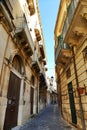 Glimpse of picturesque narrow alley of mediterranean destination Ortigia Syracuse