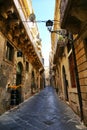 Glimpse of picturesque narrow alley of mediterranean destination Ortigia Syracuse