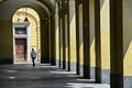 Glimpse of typical arcades in Castle square Turin Italy