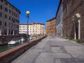 Glimpse of a Typical Livorno neighborhood in Tuscany with Venice-style waterways and Small Motor Boats Moored along the Sides,