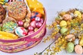 Glistened eggs and basket with easter cakes. Royalty Free Stock Photo