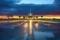 glistening airplane runway against a dusk sky