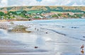 The glistening retreating sea on the seagull bathing beach at Swanage Dorset England on a September morning