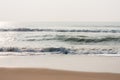 Glistening waves on beach