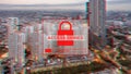 Glitchy urban cityscape background with a red Access Denied message and padlock icon, representing cyber security issues, hacking Royalty Free Stock Photo