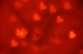 Glittar texture witn red heart bokeh. Valentinas day background. Royalty Free Stock Photo