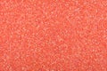 Glitter background for personal design, Christmas texture in coral tone. Royalty Free Stock Photo