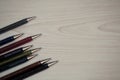 Glitter Ballpoint Pens on wooden table Royalty Free Stock Photo