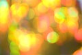 Glitter colorful bokeh sparkle gold yellow red green background  for Christmas festival or Happy new year Royalty Free Stock Photo