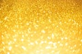 Glitter defocused abstract background with blurry lights, stars. Christmas festive texture. New year party Royalty Free Stock Photo