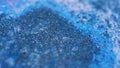 Glitter fluid spill paint drip blue black ink mix Royalty Free Stock Photo
