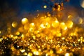 glitter gold lights grunge background, glitter defocused abstract Twinkly Lights Stars Christmas light Background.. Royalty Free Stock Photo