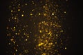 Glitter golden lights swirly bokeh background Royalty Free Stock Photo