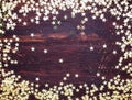 Glitter golden stars on grunge wood Royalty Free Stock Photo