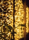 Glitter lights background. Holiday bokeh texture. Dark gold and black. Defocused Royalty Free Stock Photo