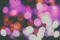 Glitter lights background. Holiday bokeh texture. Multicolored light. Defocused Christmas and xmas background. Royalty Free Stock Photo