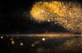 Glitter lights grunge background, gold glitter defocused abstract Twinkly gold Lights Background