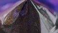Glitter pyramid paint spill blue purple bronze ink Royalty Free Stock Photo