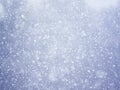 Glitter and snow for Christmas. Sparkling magical dust particles. Winter pattern best for Christmas design. Abstract background wi