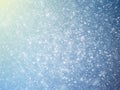 Glitter and snow for Christmas. Sparkling magical dust particles. Winter pattern best for Christmas design. Abstract background wi