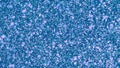 Glitter sparkles blue background