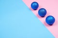 Glitter spheres on pink and blue background