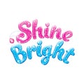 Glitter text Shine Bright. Drawing for kids clothes, t-shirts, fabrics or packaging. Pink and blue words with sparkles