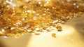 Glitter texture of yellow sparkles laying on the table. Golden peaces of plastic sequins