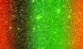 Glitter textured green red orange background wallpaper.