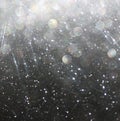 Glitter vintage lights background abstract white and black background defocused