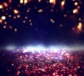 Glitter vintage lights background. black, gold, purple, blue and red. de-focused Royalty Free Stock Photo