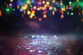 Glitter vintage lights background. black, purple, blue and gold. de-focused Royalty Free Stock Photo